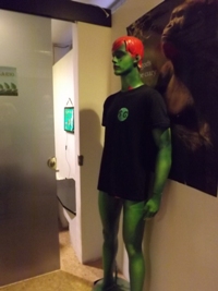 Green man guarding the dispensary at Smoke Green club