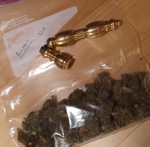 Brass pipe and a bag of the Twitter strain