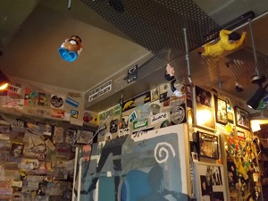 Toys on the ceiling at Grey Atea coffeeshop