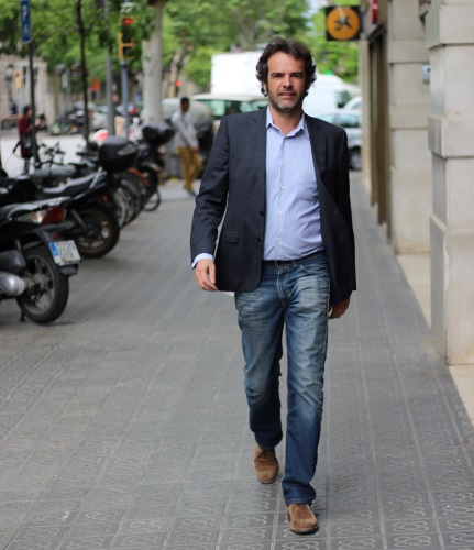 Oriol Casals Madrid walking on Calle Casp in Barcelona