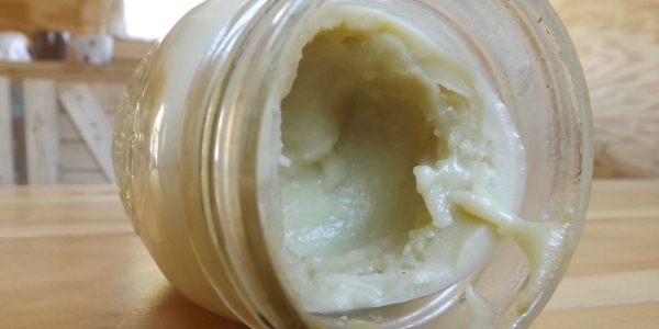 Closeup of green coconut cannabis oil