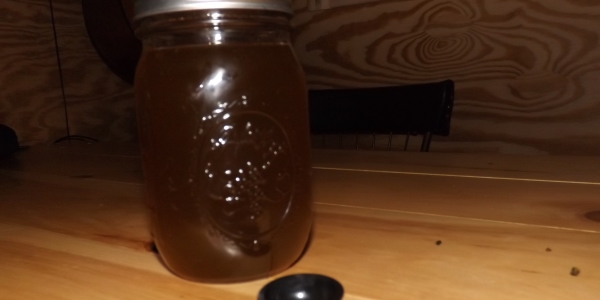 Finished coconut cannabis oil before congealing