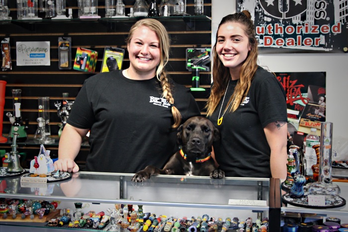 Destioney and puppy and partner at Rip Tide Head Shop in Belfast Maine
