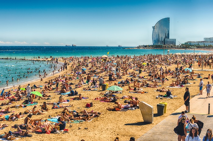 The beach of Barceloneta and W Hotel in Barceloneta Barcelona Spain